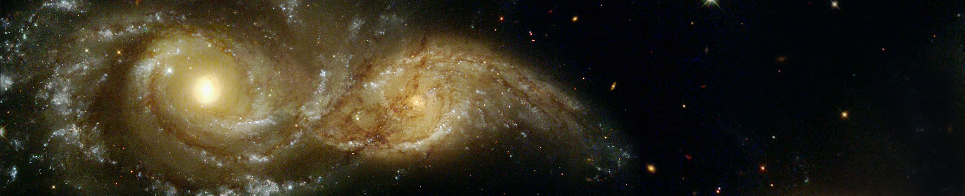 זוג גלקסיות ספירליות שכמעט מתנגשות. צילום: © NASA and the Space Telescope Science Institute (STScI).